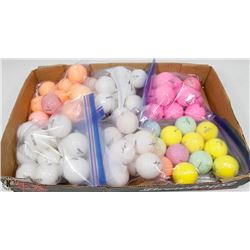 FLAT OF COLORED RECLAIMED GOLF BALLS.
