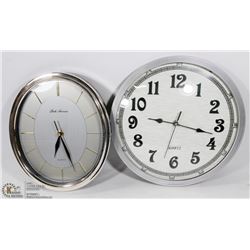 BOX OF 2 SHOWHOME CLOCKS - ONE PARK AVENUE AND