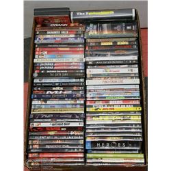 FLAT OF 70 ASSORTED DVDS & BLURAYS.