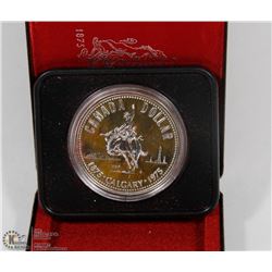 1975 CANADIAN SILVER DOLLAR IN DISPLAY