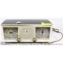 1960 ZENITH CLOCK RADIO MODEL C519.