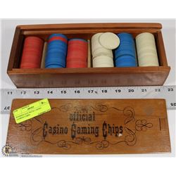 WOODEN BOX WITH CASINO GAMING CHIPS.