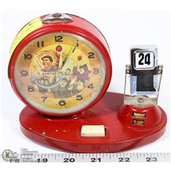 MAO DESK ALARM CLOCK WITH REVOLVING DATE.