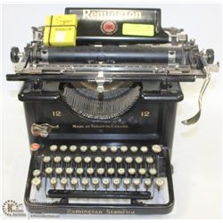 1920 REMINGTON TYPE WRITER WITH COVER CLOTH.