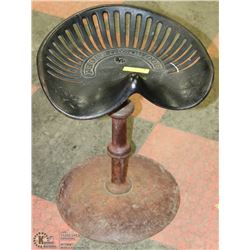 ANTIQUE FROST AND WOOD ORNATE TRACTOR SEAT STOOL