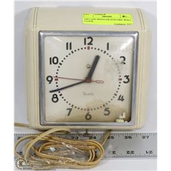 VINTAGE WESTLOX ELECTRIC WALL CLOCK.