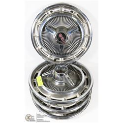 SET OF FOUR 1960S NOVA SS SPINNER HUBCAPS.