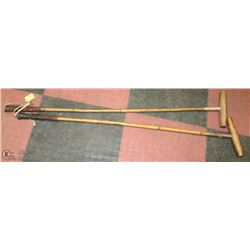 PAIR OF ANTIQUE POLO MALLETS.