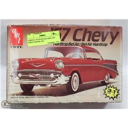 UNBUILT 30 YEAR OLD AMT 1957 CHEVY MODEL KIT.