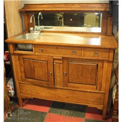 OAK SIDEBOARD WITH MIRROR CONVERTED TO BAR.