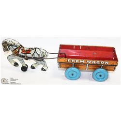 1950S TINPLATE FARM WAGON TOY.
