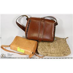 2 HAND TOOLED LEATHER PURSES WITH OTHER PURSE.