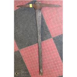 VINTAGE PICK AXE.