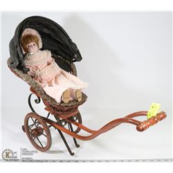 VICTORIAN DOLL STROLLER WITH PORCELAIN DOLL