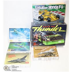 LOT OF 6 VINTAGE UNBUILT MODEL KITS.