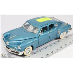 1948 TUCKER 1:18 SCALE BY SIGNATURE DIE CAST.