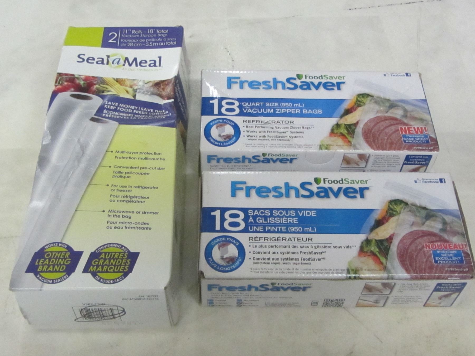 New foodsaver zipper bags & 2 seal a meal 11" x 18ft rollsstorage bags