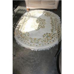 OVAL FRINGED AREA CARPET