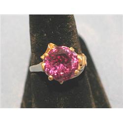 RING W/PURPLISH STONE