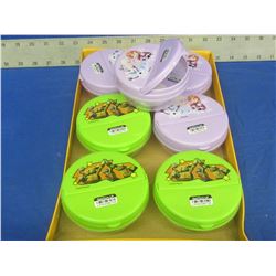 Flat of 7 flip top snack containers / 4 are Disney Frozen & 3 are Ninja Turtle
