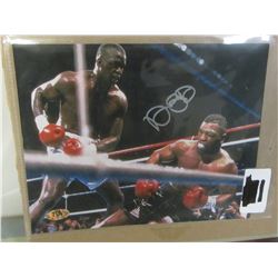 Hand signed Buster Douglas with COA , Knocking out Mike Tyson