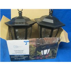 2 hanging solar lights / untested & the stakes  to hang lights on is missing