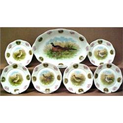 Seven piece game plate set including six 9" p