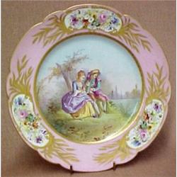 Sevres plate, two seated figures in landscape