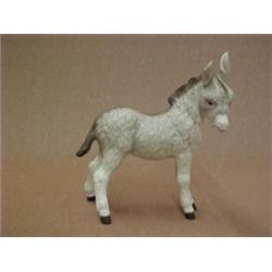 Cybis figurine of donkey, signed inside leg,