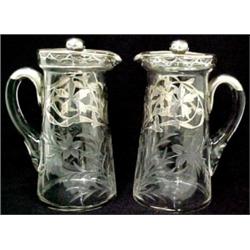 A pair of sterling overlay cut glass lemonade