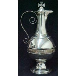 Sterling silver wine jug, cross finial on hin