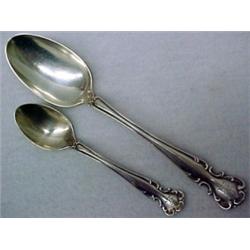 A grouping of sterling silver spoons by Simon