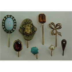 One lot of eight stickpins including gold wit