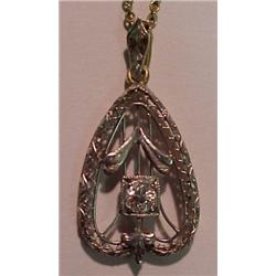 14K gold and diamond filigree pendant with ch