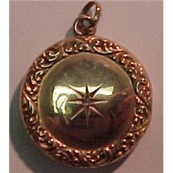 10K gold and diamond locket, 1" diameter roun