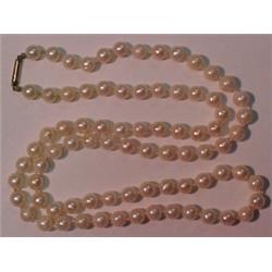 Cultured pearl necklace, 25" strand of indivi
