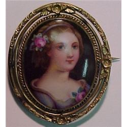 Gold filled portrait pin, bust of a young wom