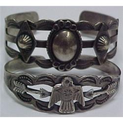 Two Native American sterling silver cuff brac