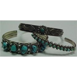 Three Native American sterling silver and tur