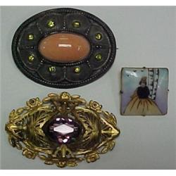 Three early costume jewelry pins, brass filig