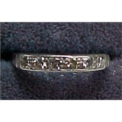 Platinum and diamond wedding band set with si