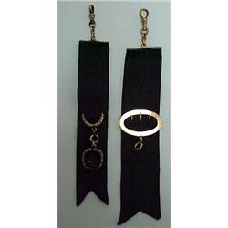 Two watch fobs, one buckle motif marked 14K o