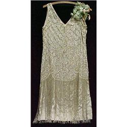 Beaded flapper dress, ivory background with s