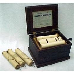 Columbian Orguinette, with four paper music r