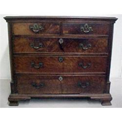 Walnut Chippendale chest of drawers, two shor