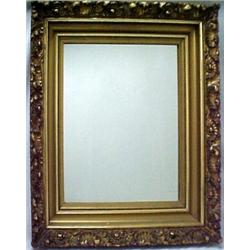 Gilt plaster over wood framed mirror, shell a