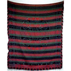 Woven jacquard coverlet in green, blue, and r