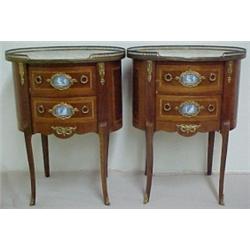 A pair of French oval stands, marbletop with
