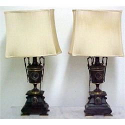 A pair of bronze and slate Victorian lamps, m
