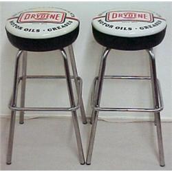 A pair of advertising bar stools, Drydene Mot